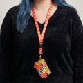 Ban.do Zip ID Lanyard in Black Stripe with Charm | Badge Holder Zippered Pouch with Keychain